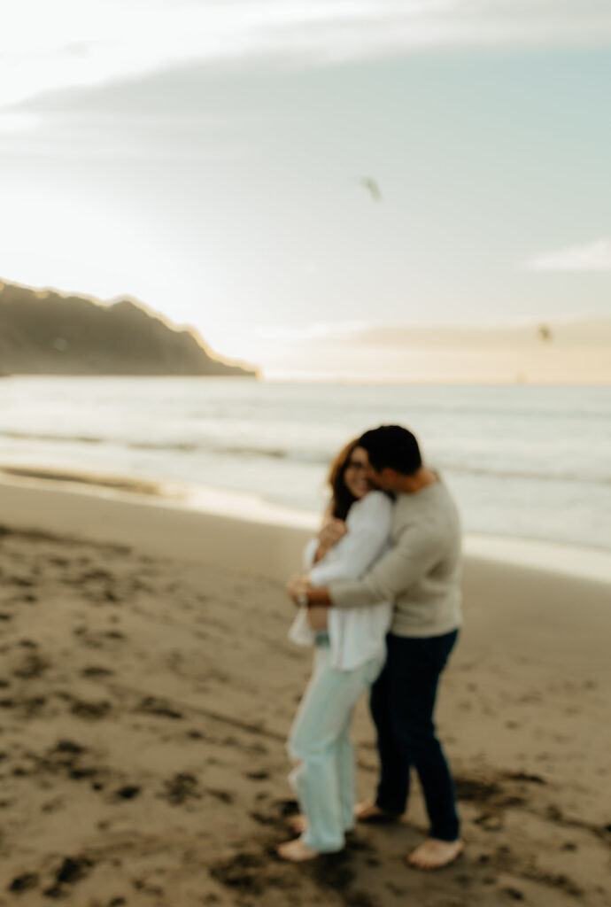 Couples maternity pictures on Bakers Beach in San Francisco, California