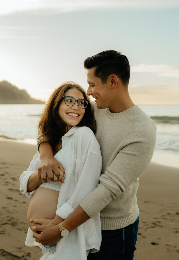 Couples maternity pictures on Bakers Beach in San Francisco, California