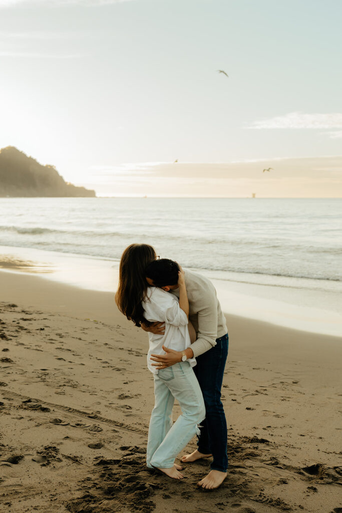 Couples maternity pictures on Bakers Beach in San Francisco, California