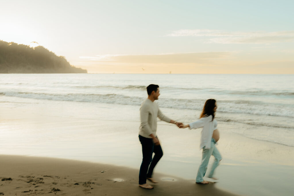 Couples maternity pictures on Bakers Beach in San Francisco, California