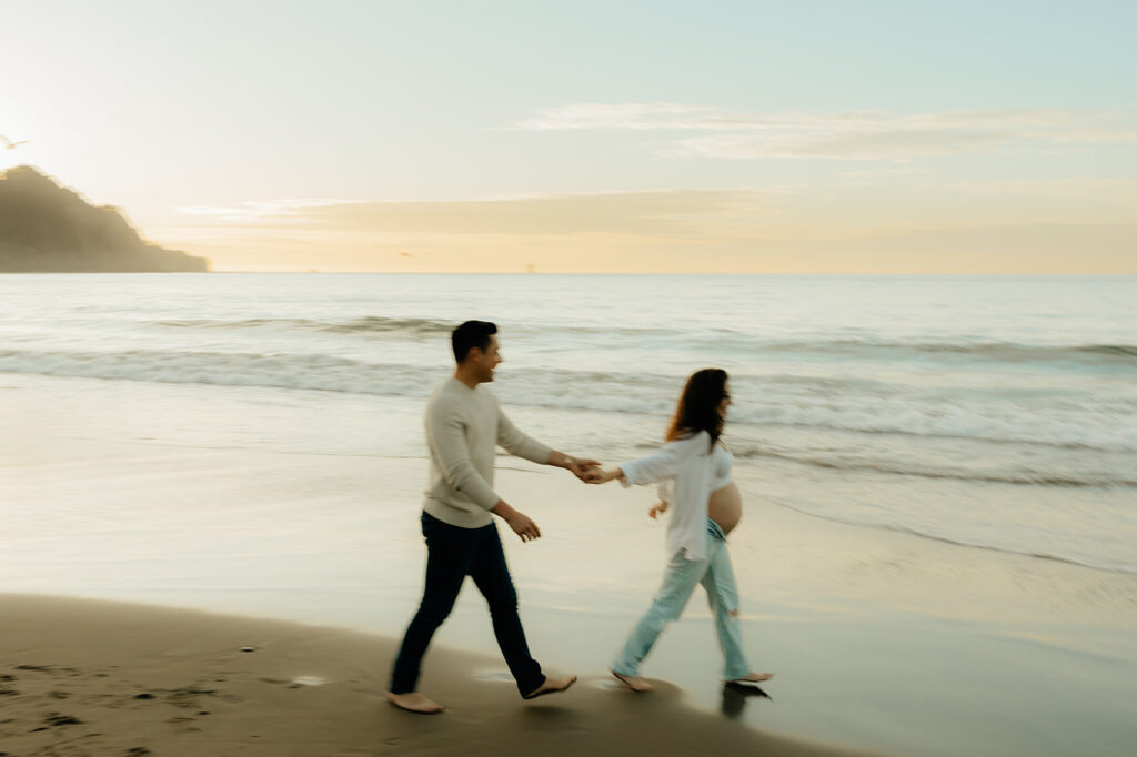 Couples maternity pictures on Bakers Beach in San Francisco, California