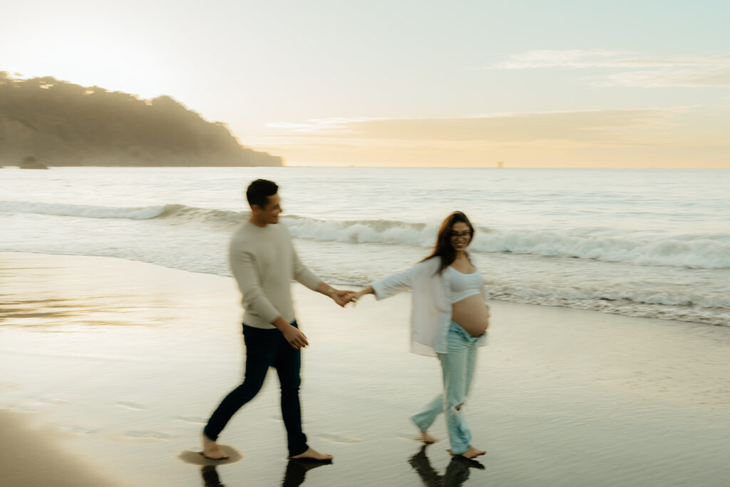 Couples maternity pictures on Bakers Beach in San Francisco, California