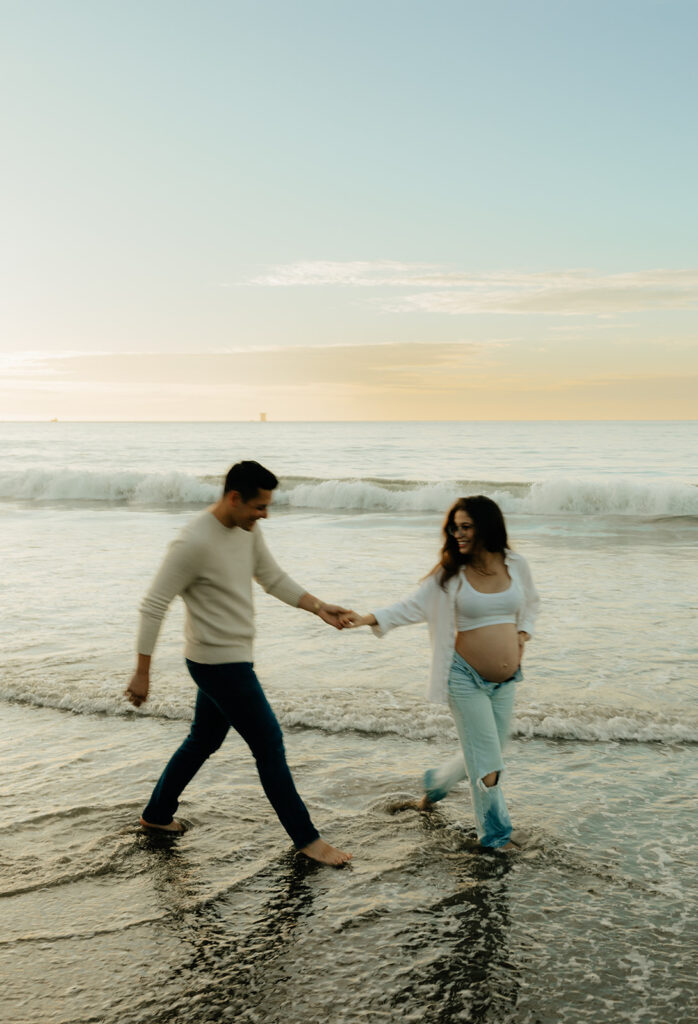 Couples maternity pictures on Bakers Beach in San Francisco, California