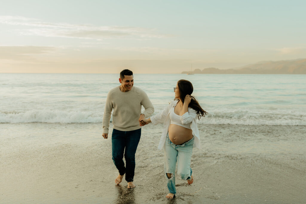 Couples maternity pictures on Bakers Beach in San Francisco, California