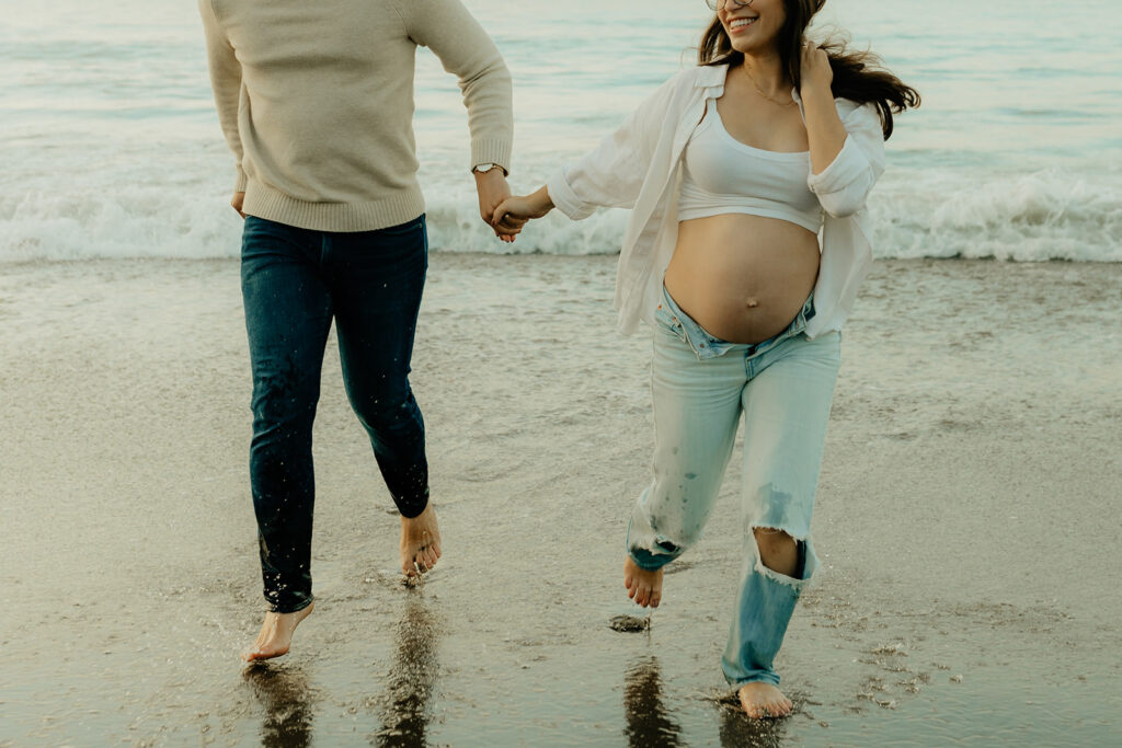 Couples maternity pictures on Bakers Beach in San Francisco, California