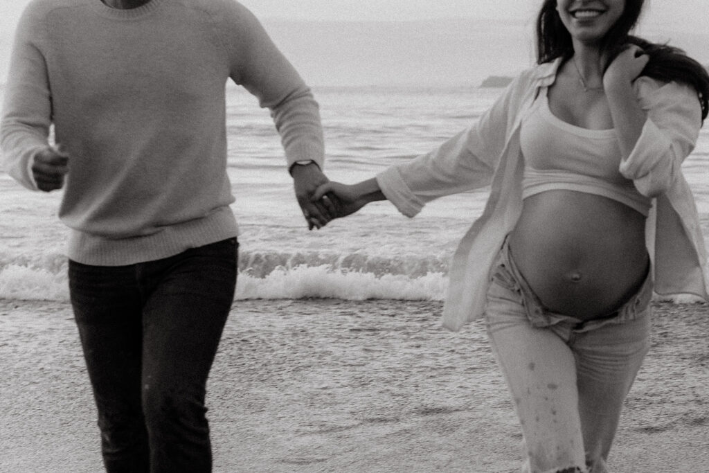 Couples maternity pictures on Bakers Beach in San Francisco, California