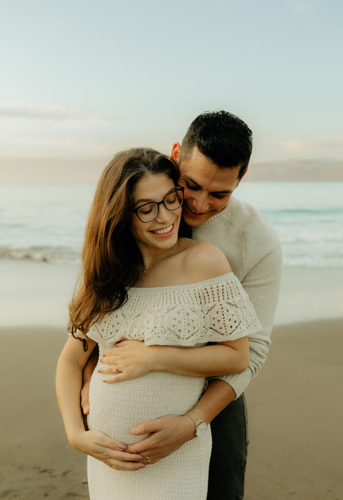 Couples maternity pictures on Bakers Beach in San Francisco, California