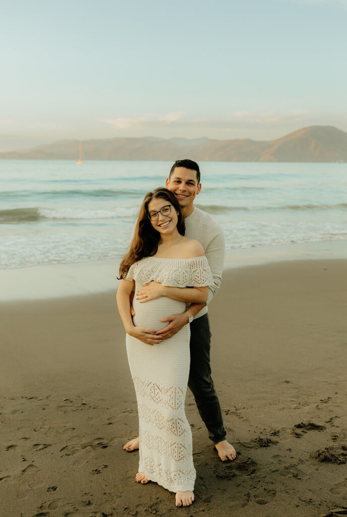 Couples maternity pictures on Bakers Beach in San Francisco, California