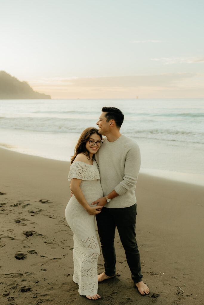 Couples maternity pictures on Bakers Beach in San Francisco, California