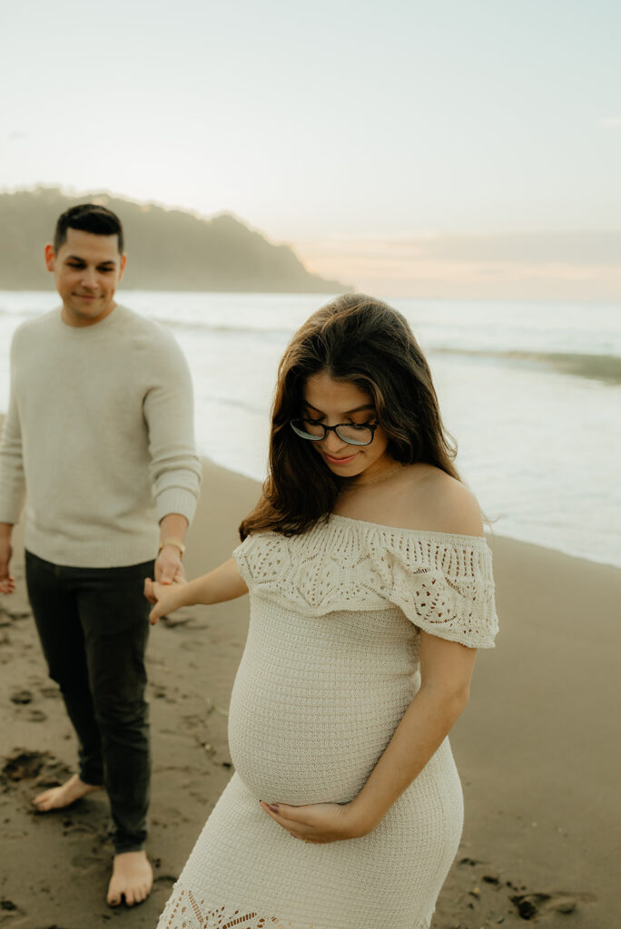 Couples maternity pictures on Bakers Beach in San Francisco, California