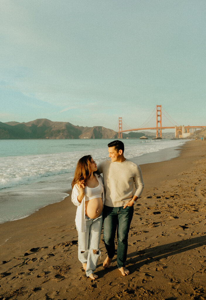 Couples maternity pictures on Bakers Beach in San Francisco, California
