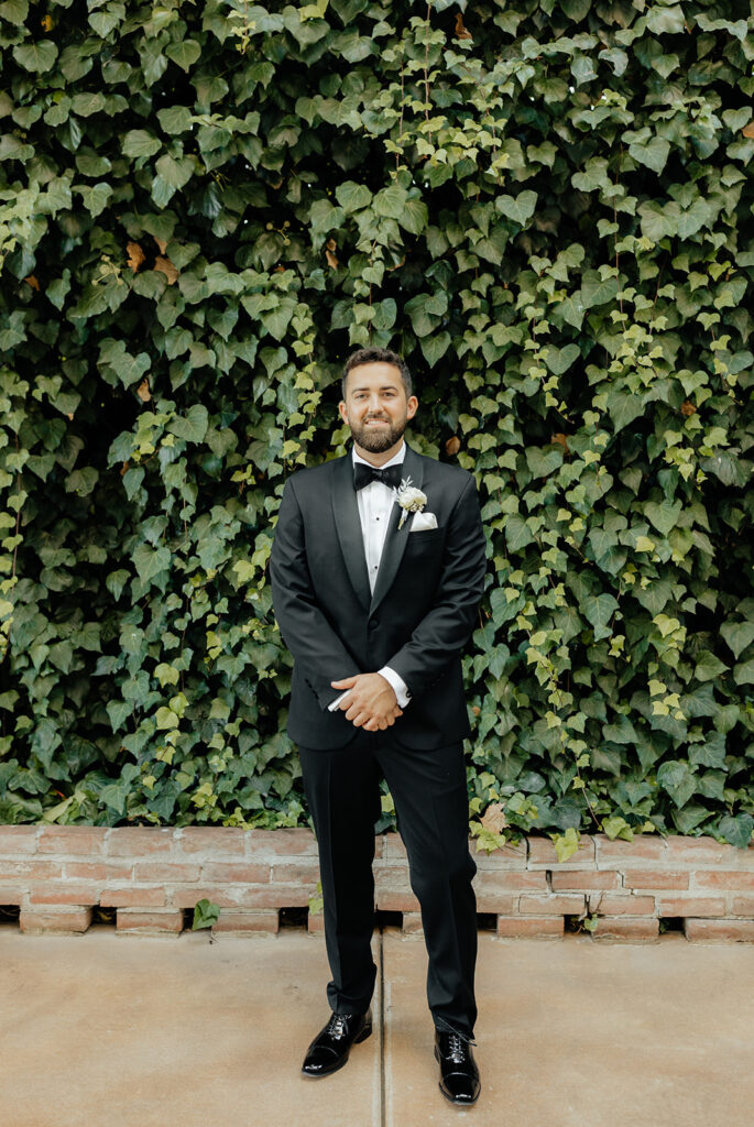 Grooms portraits from a The Grand Island Mansion wedding in Sacramento
