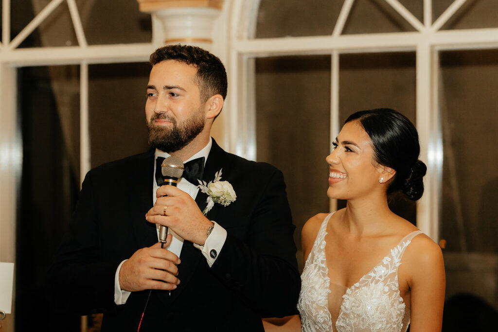 Bride and groom giving speech