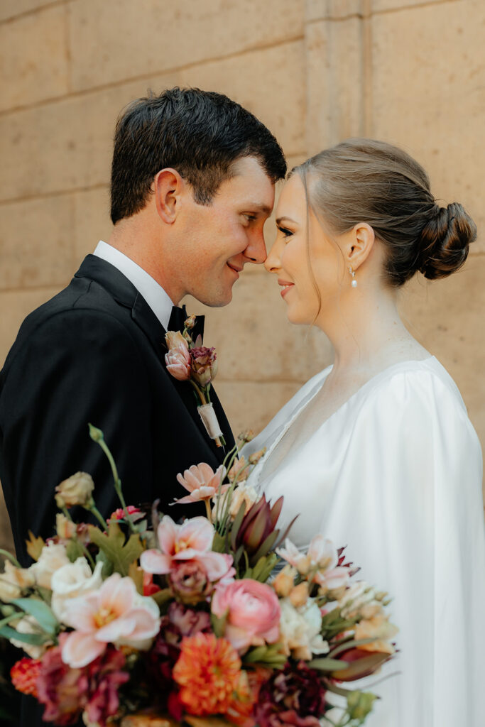 Bride and groom portraits at The Palace of Fine Arts in SF
