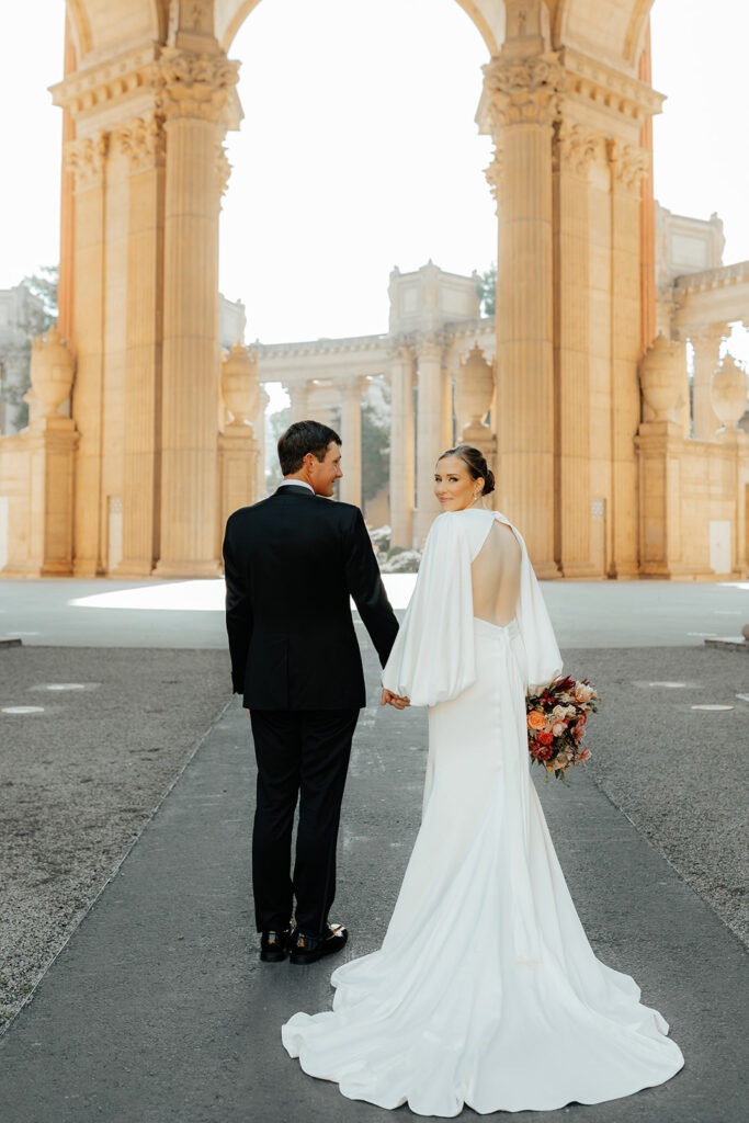 Bride and groom portraits at The Palace of Fine Arts in SF