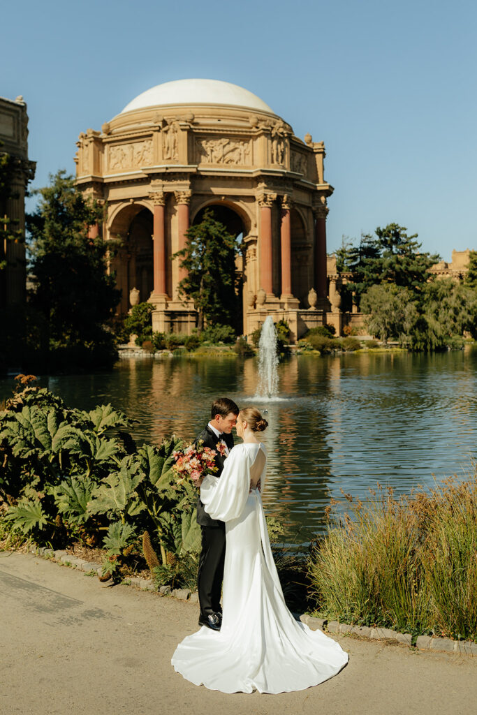 Bride and groom portraits at The Palace of Fine Arts in SF