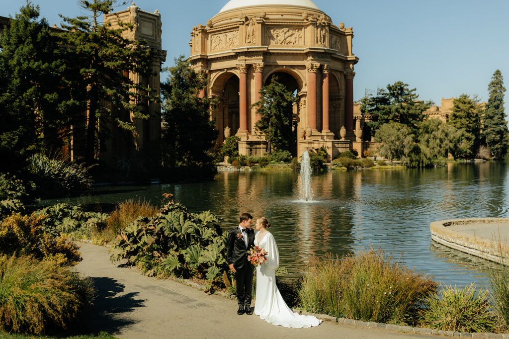 Bride and groom portraits at The Palace of Fine Arts in SF