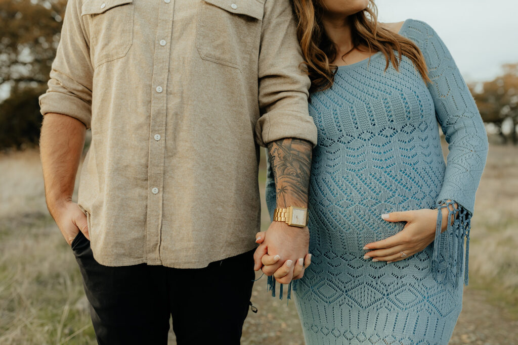 Man and woman posing for photos