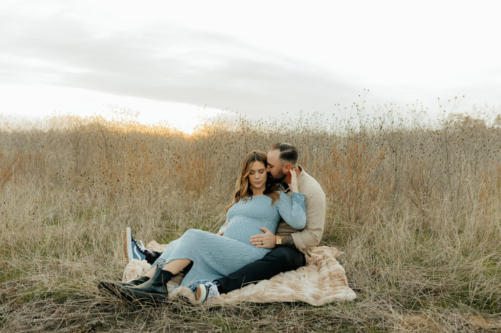 Couples romantic Sacramento maternity photos in an open field