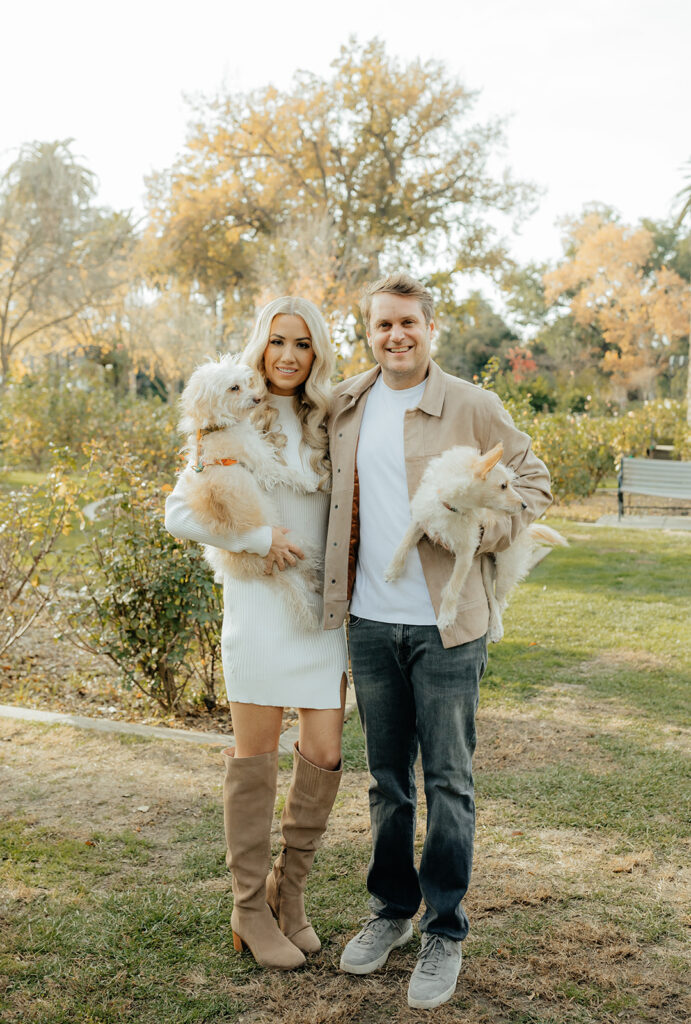 Couples Sacramento engagement photos at McKinley Park with their two dogs