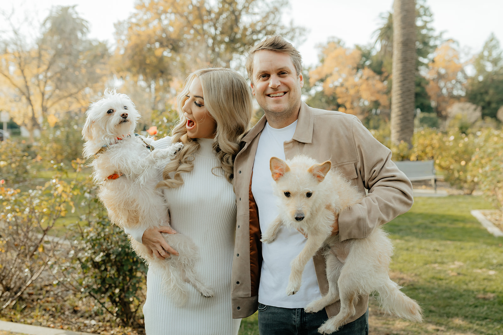 Couples Sacramento engagement photos at McKinley Park with their two dogs