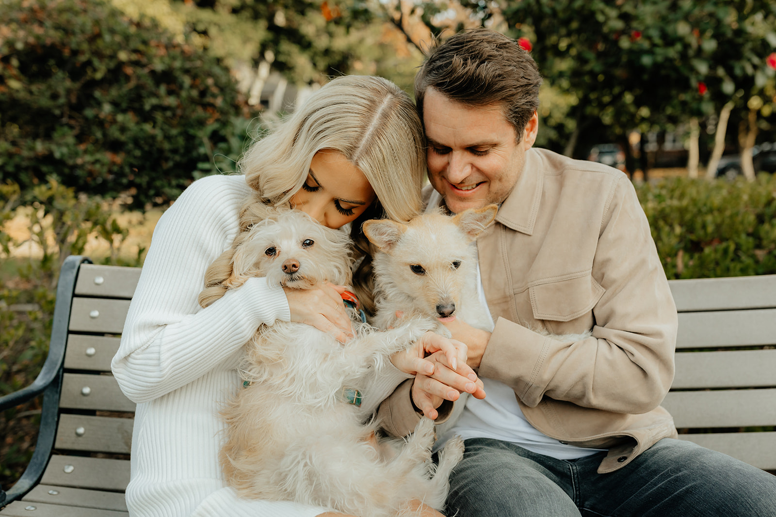 Couples Sacramento engagement photos at McKinley Park with their two dogs