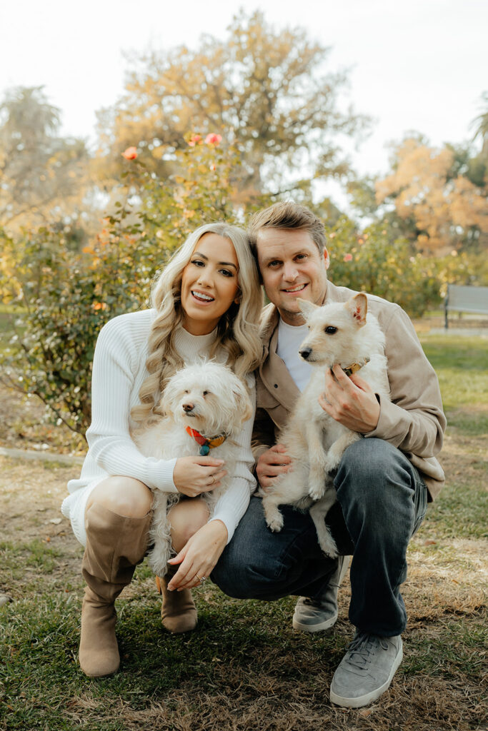 Couples Sacramento engagement photos at McKinley Park with their two dogs