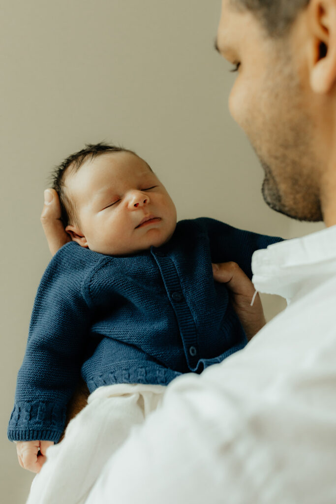 Father holding son