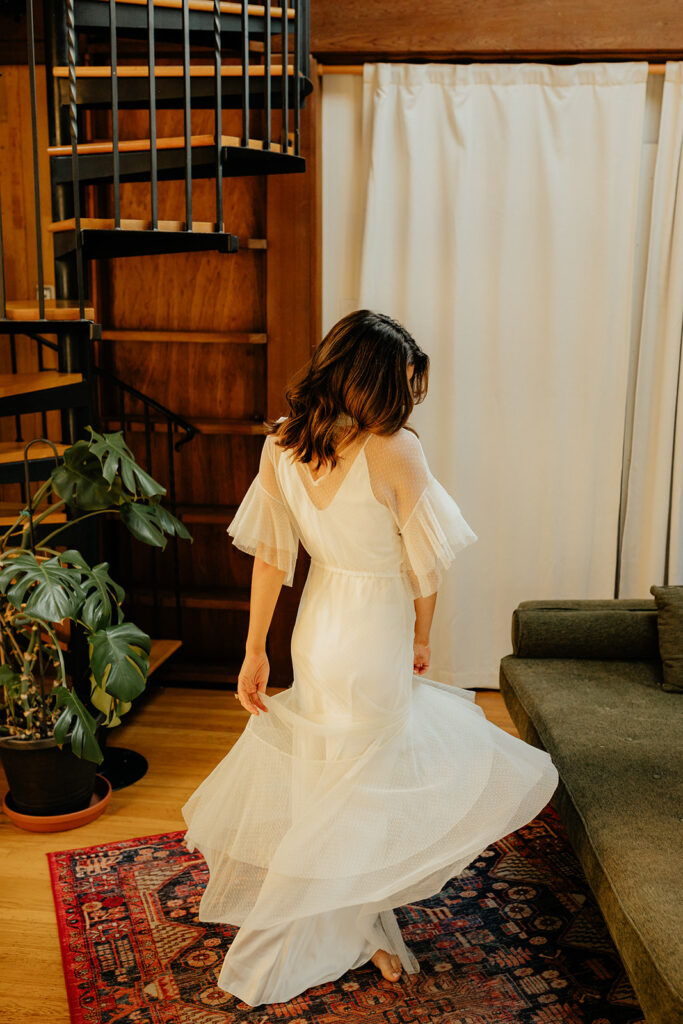 Bride twirling in her dress