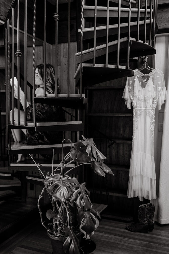 Bride reading her vows on staircase 