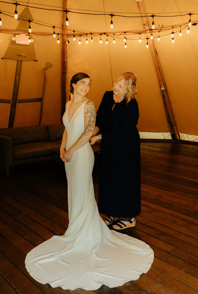 bride getting ready for her intimate outdoor wedding 
