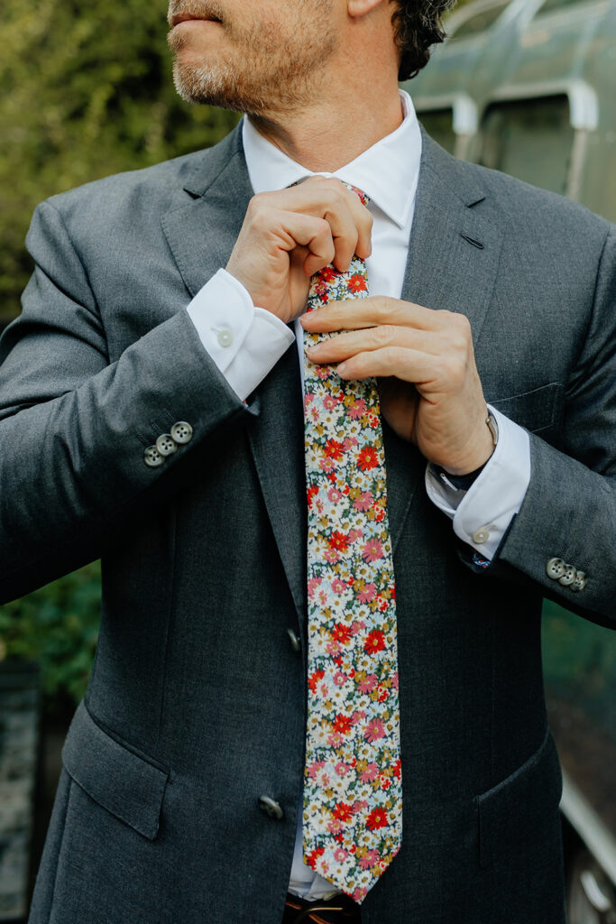 groom at his intimate outdoor wedding
