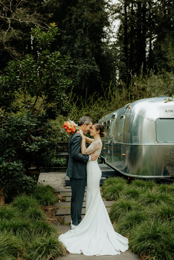 bride and groom looking at each other at their intimate outdoor wedding 