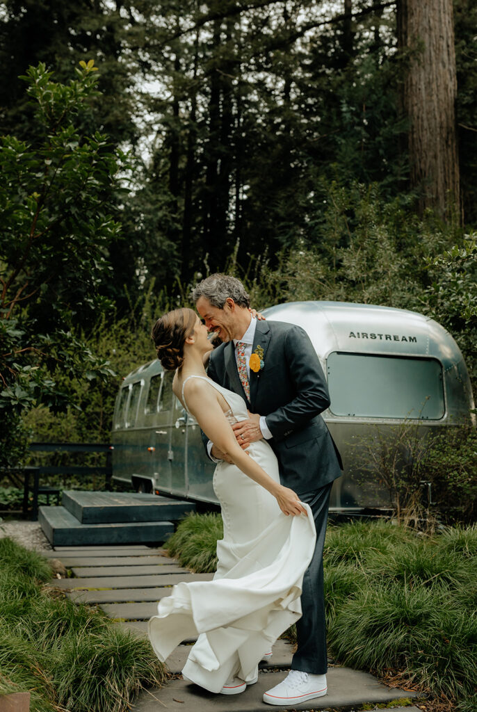 bride and groom kissing after their wedding ceremony