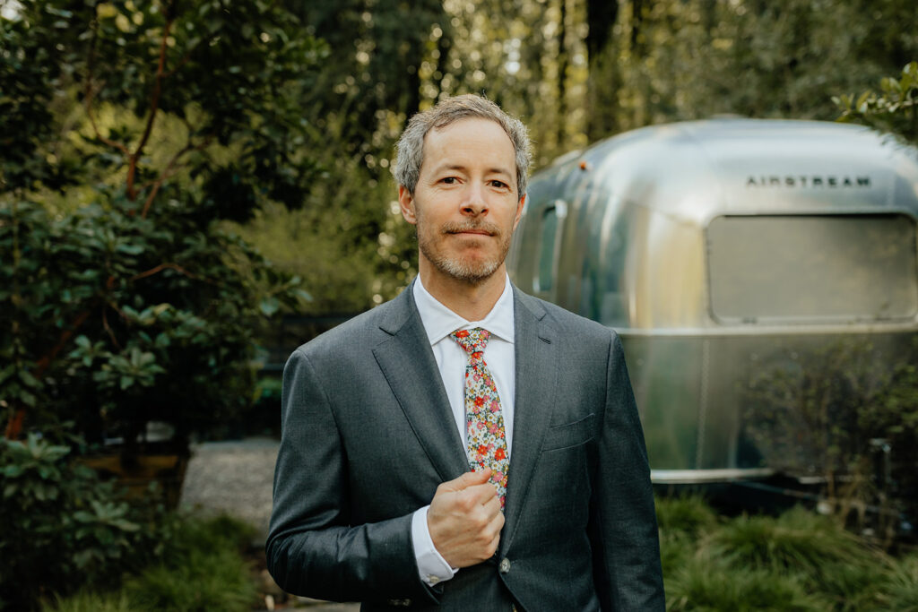 groom before his intimate outdoor wedding ceremony