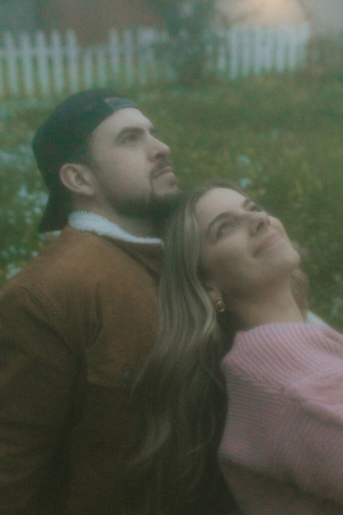 gorgeous couple looking at the sky