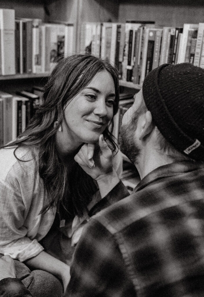 engaged couple looking at each other