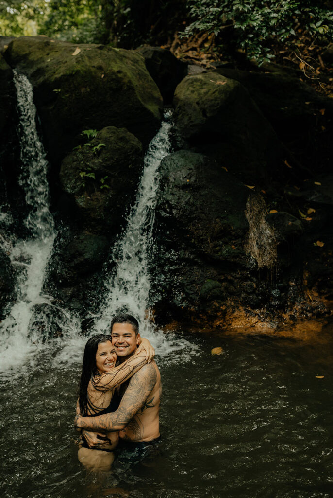 couple smiling looking at the camera 