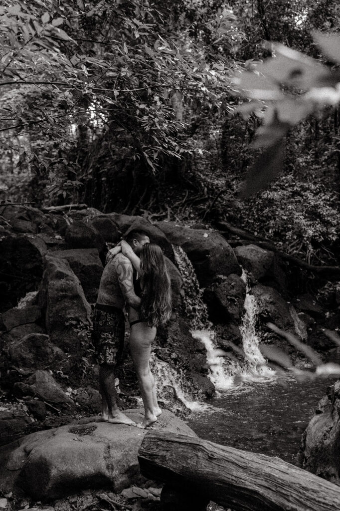 beautiful couple hugging during their Playful Waterfall Couple Photoshoot