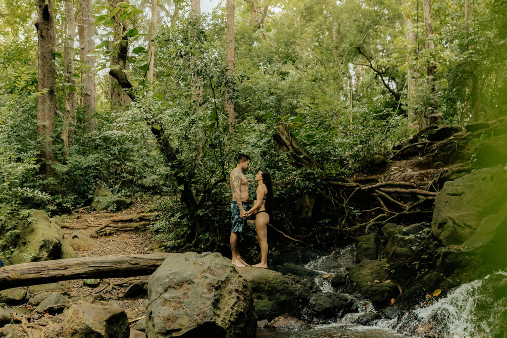 couple holding hands looking at each other