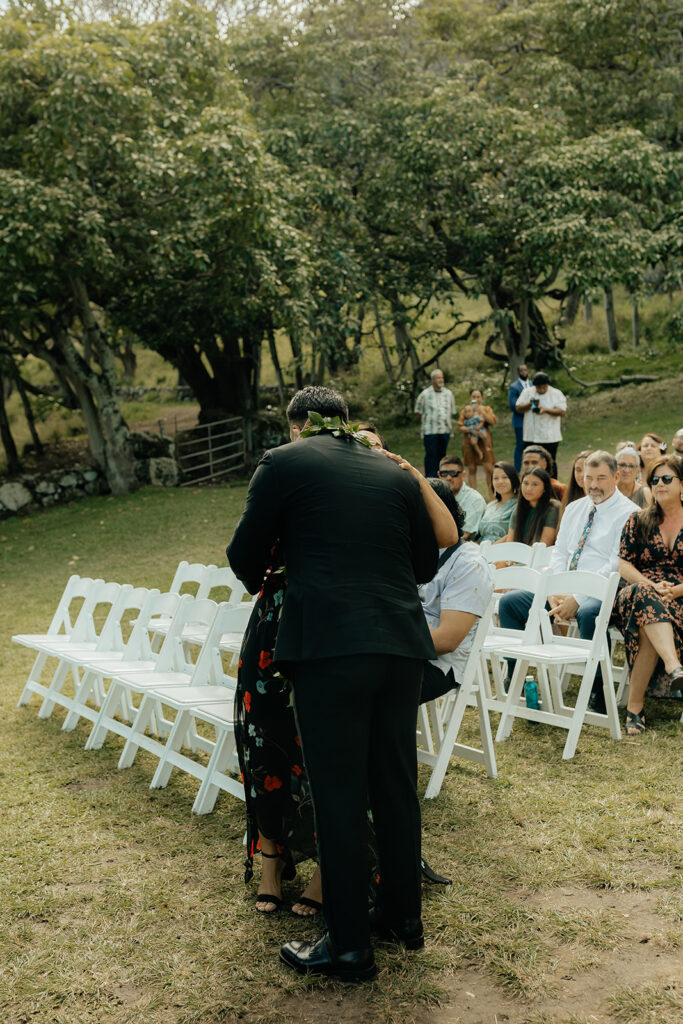 groom hugging his mom