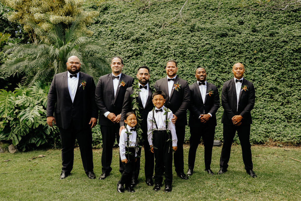 groom and his groomsmen Colorful Eco-Friendly Wedding at Kualoa Ranch, HI