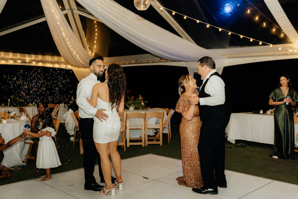 bride and groom dancing
