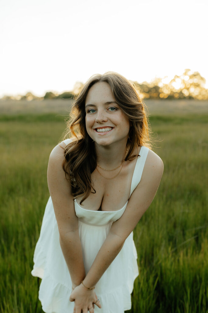 happy newly grad at her photoshoot 