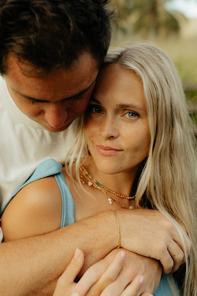 happy couple hugging during their session