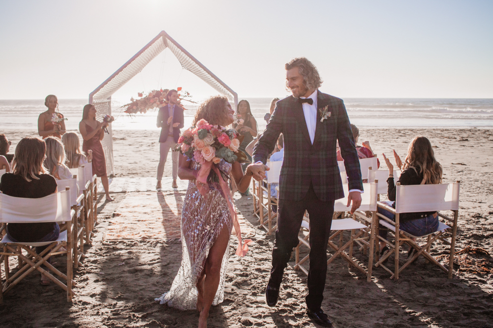 Rachel Christopherson San Luis Obispo Boho Beach Elopement Wedding Bride and Groom Recessional Happy