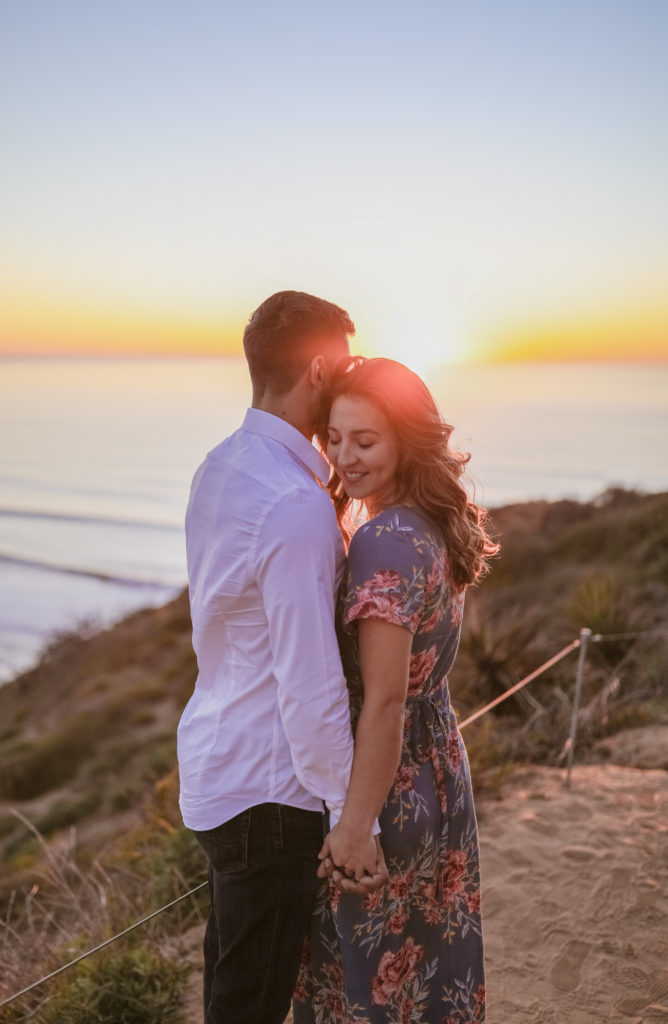 Rachel Christopherson Torrey Pines San Diego Engagement Sunset Ocean Hold Hands Long