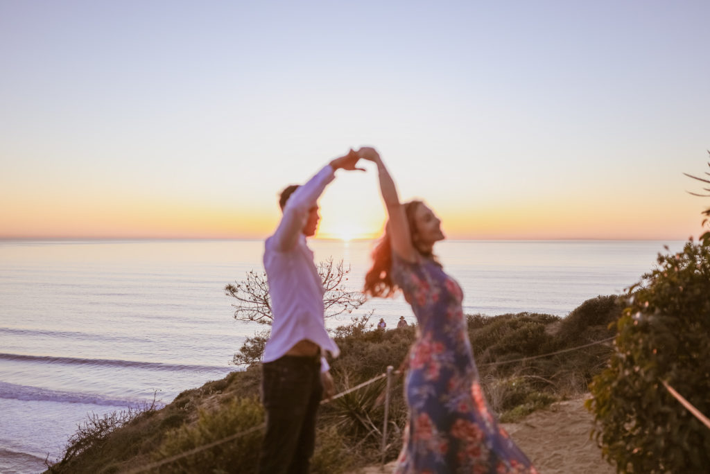Rachel Christopherson Torrey Pines San Diego Engagement Sunset Ocean Twirling