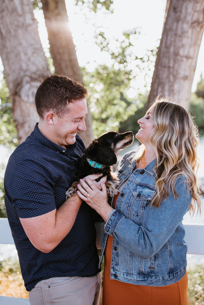 Sacramento River Engagement Session Northern California Weiner dog engagement shoot outfit inspo engagement photos with dog couples shoot posing golden hour sacramento river rachel christopherson photography dog and giggles