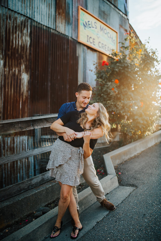 Sacramento River Engagement Session Northern California Weiner dog engagement shoot outfit inspo engagement photos with dog couples shoot posing golden hour sacramento river rachel christopherson photography classic rustic dip 